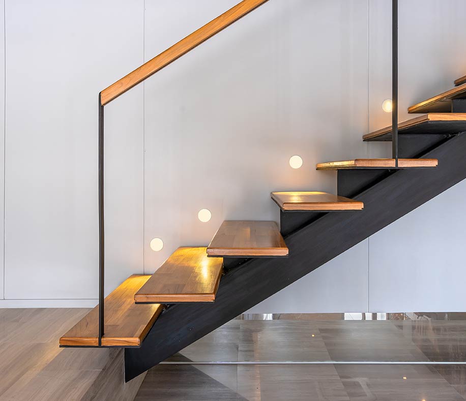 Floating staircase with LED step lighting
